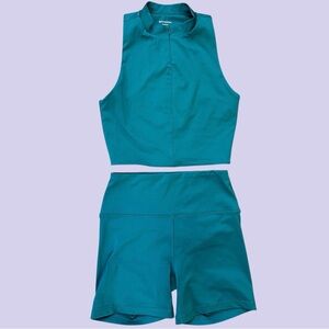 Reformation EcoMove teal workout shorts set